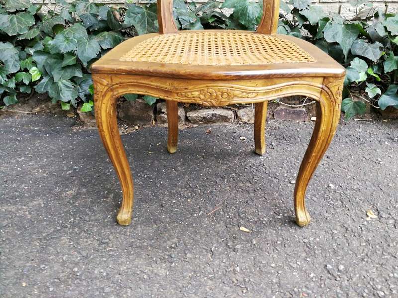 A 20th Century Circa Mid 1950s Set Of Eight French Carved Oak Dining Chairs