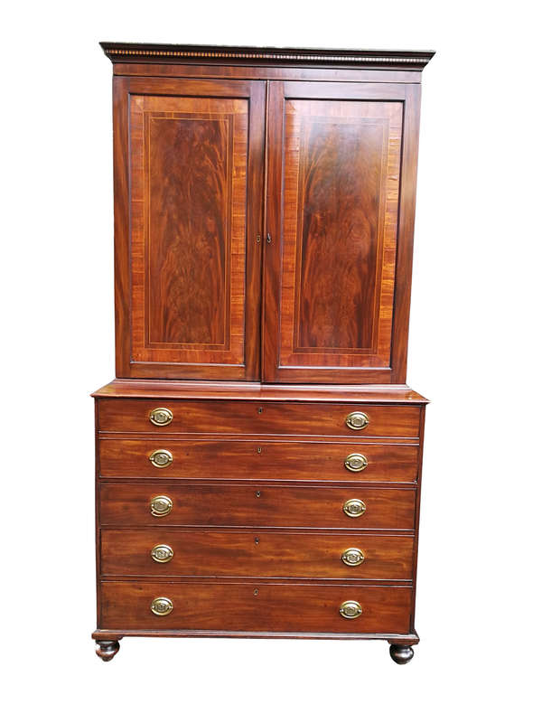 A Mid 19th Century Victorian Mahogany Secretaire. The interior fitted with a gilt-tooled green le...