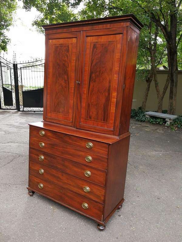 A Mid 19th Century Victorian Mahogany Secretaire. The interior fitted with a gilt-tooled green le...