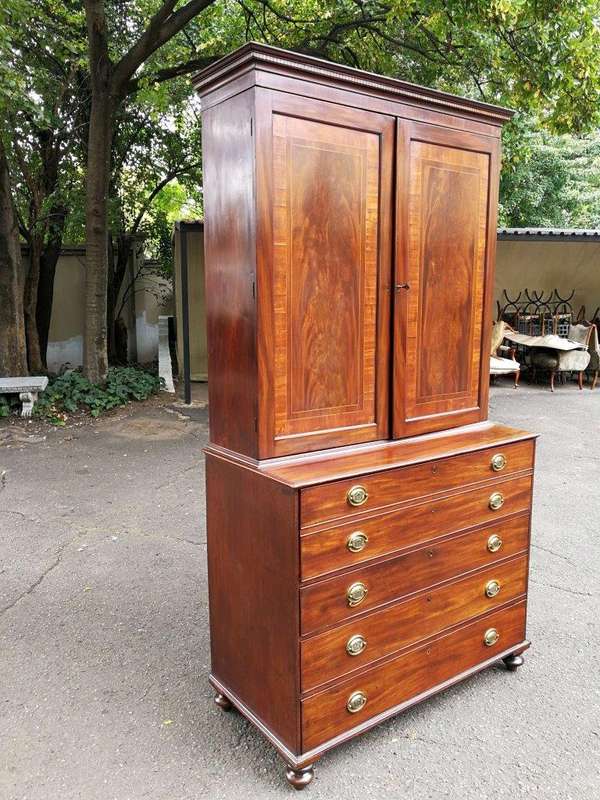 A Mid 19th Century Victorian Mahogany Secretaire. The interior fitted with a gilt-tooled green le...