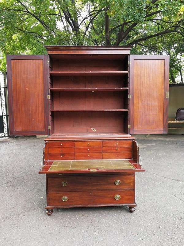 A Mid 19th Century Victorian Mahogany Secretaire. The interior fitted with a gilt-tooled green le...
