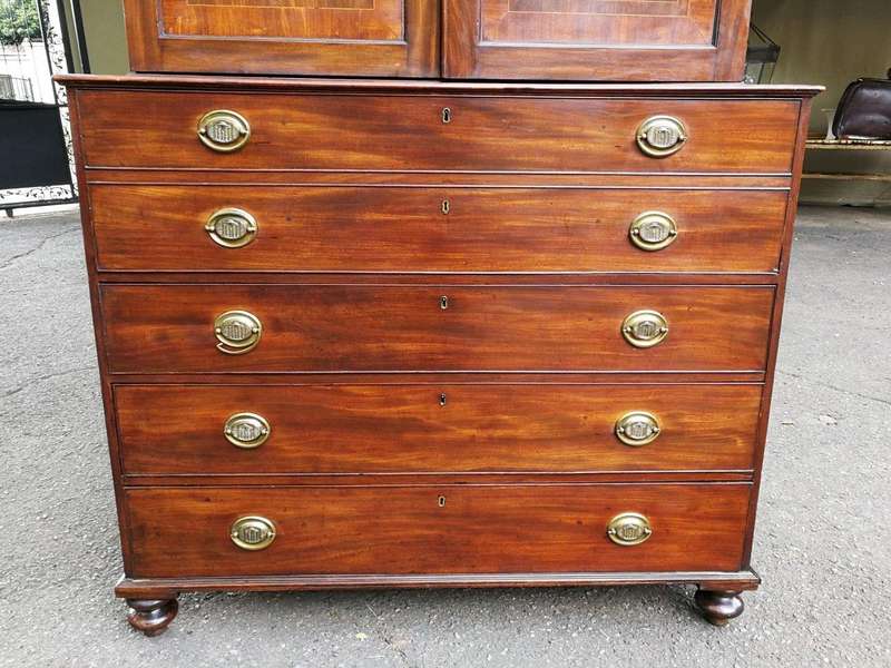 A Mid 19th Century Victorian Mahogany Secretaire. The interior fitted with a gilt-tooled green le...