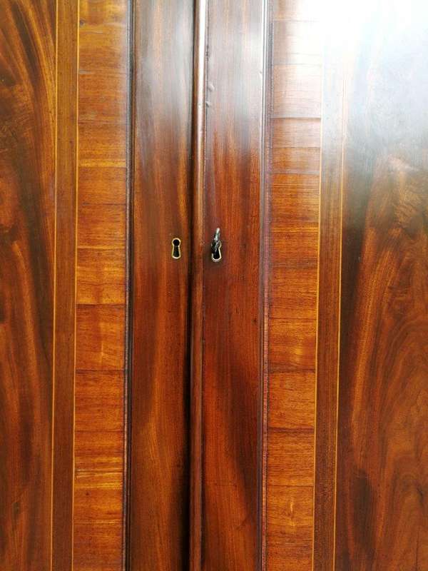 A Mid 19th Century Victorian Mahogany Secretaire. The interior fitted with a gilt-tooled green le...