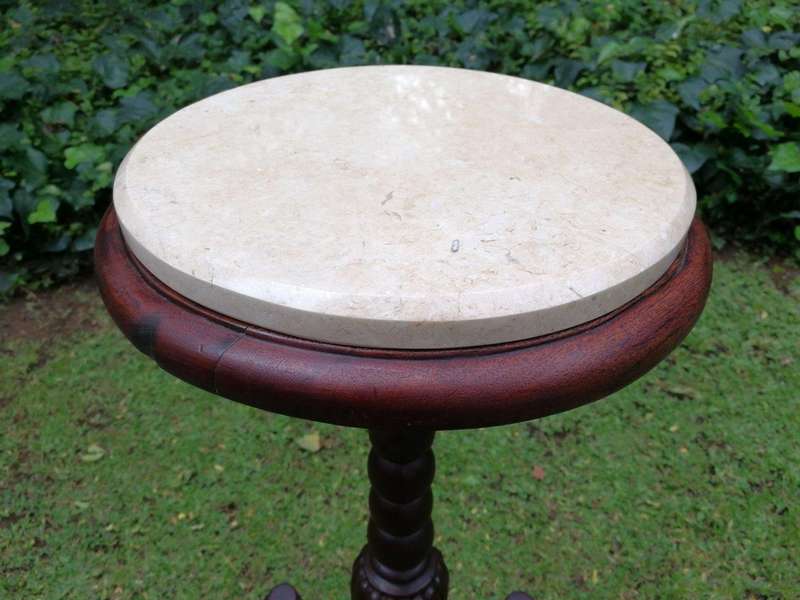 An Early 20th Century Teak Wine Table With Marble Top