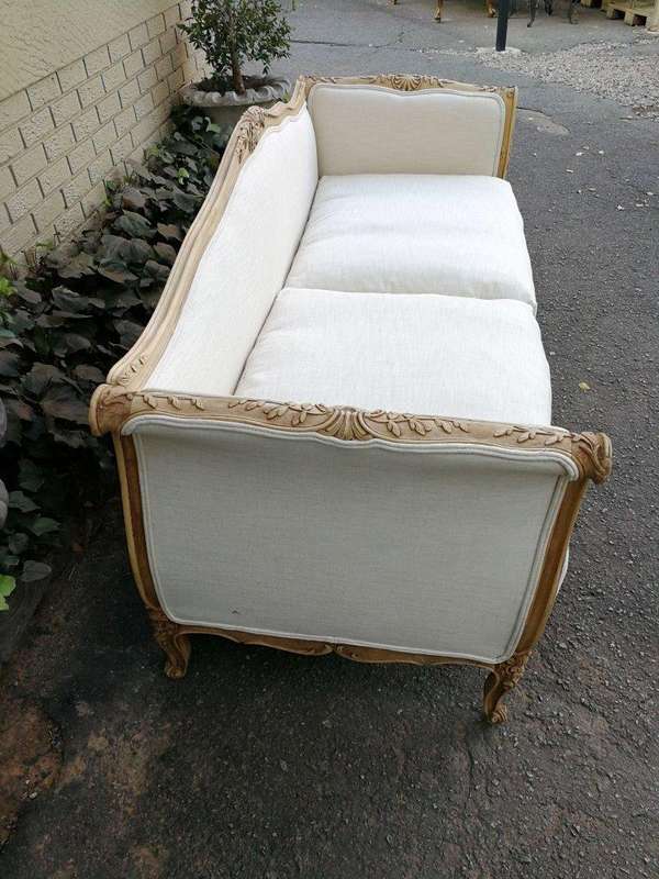 A Late 19th Century (Circa 1880) French Walnut Carved and Bleached Settee Upholstered in a French...