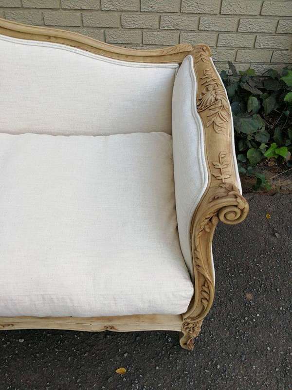 A Late 19th Century (Circa 1880) French Walnut Carved and Bleached Settee Upholstered in a French...