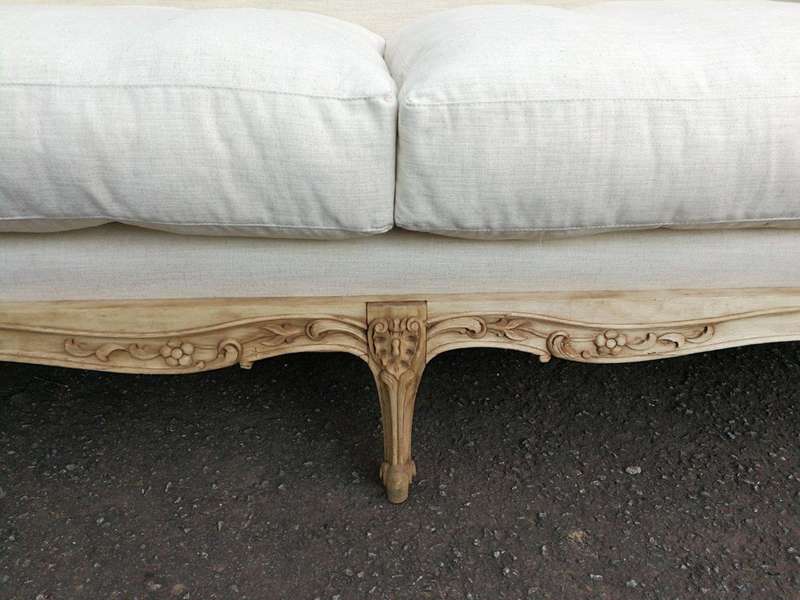 A Late 19th Century (Circa 1880) French Walnut Carved and Bleached Settee Upholstered in a French...