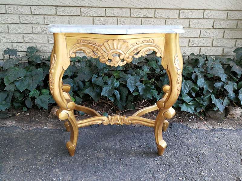 A 20th Century Style Carved and Wooden Hand Gilded Console Table With Marble Top