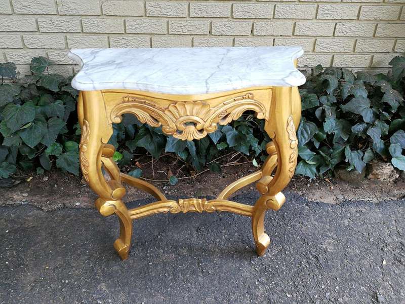 A 20th Century Style Carved and Wooden Hand Gilded Console Table With Marble Top
