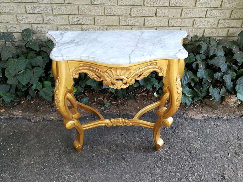 A 20th Century Style Carved and Wooden Hand Gilded Console Table With Marble Top