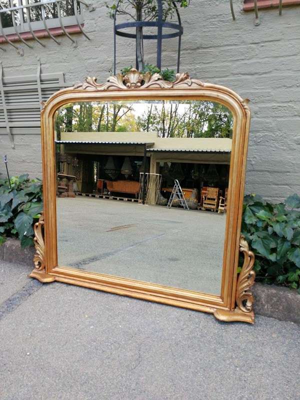 A 20th Century Victorian Style Gilt Painted Bevelled Mirror