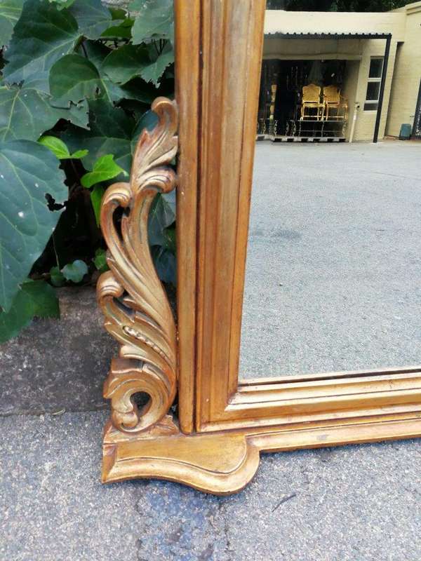 A 20th Century Victorian Style Gilt Painted Bevelled Mirror