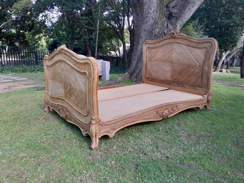 A 19th Century Circa 1880 Ornately Carved and Inlaid Marquetry Bed in a Contemporary Bleached Finish