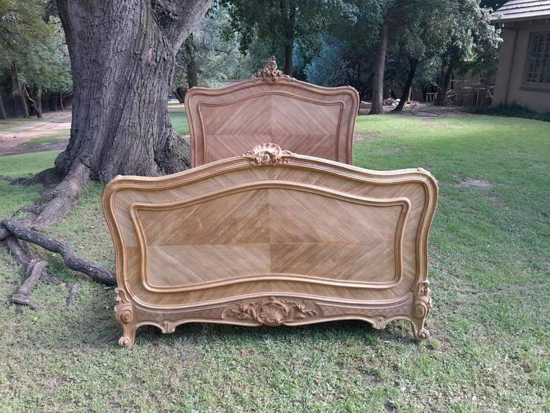 A 19th Century Circa 1880 Ornately Carved and Inlaid Marquetry Bed in a Contemporary Bleached Finish