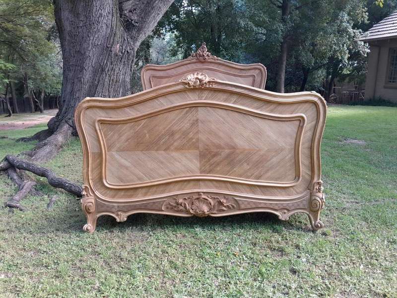 A 19th Century Circa 1880 Ornately Carved and Inlaid Marquetry Bed in a Contemporary Bleached Finish