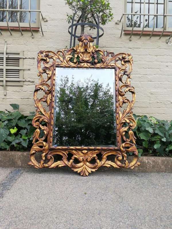 An Early 20th Century Spanish Carved Gilt Painted Wooden Bevelled Mirror
