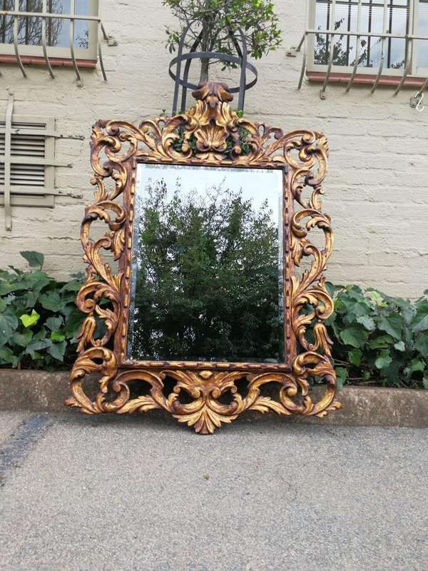 An Early 20th Century Spanish Carved Gilt Painted Wooden Bevelled Mirror