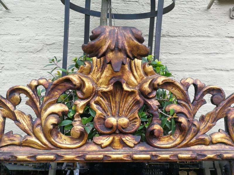 An Early 20th Century Spanish Carved Gilt Painted Wooden Bevelled Mirror