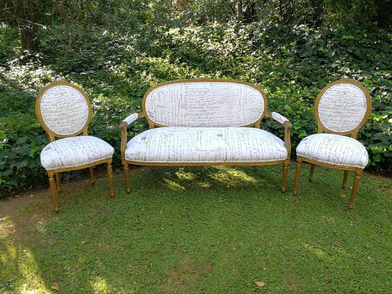An Early 20th Century Set Of French Giltwood Louis XVI Style Settee And Pair of Chairs Upholstere...