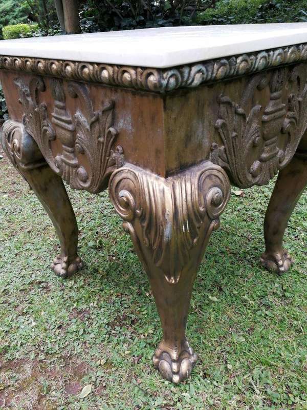 A Gilt Wood Coffee Table With Cream Marble Top