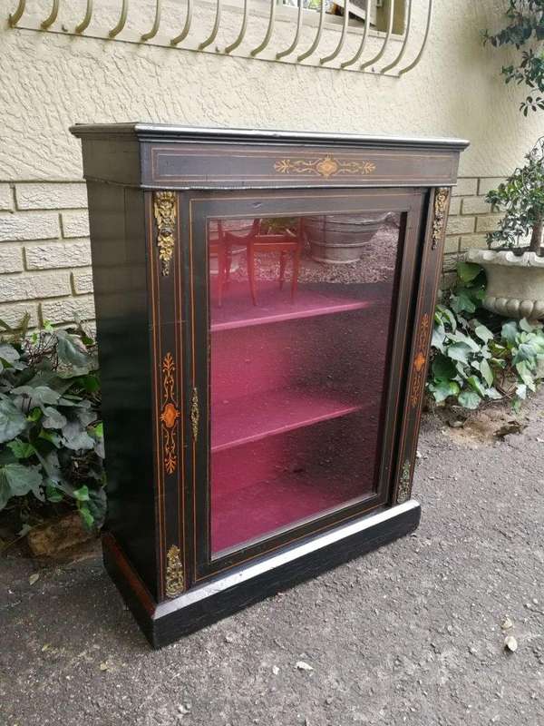 An Antique Victorian Ebonised And Marquetry Pier Cabinet With Gilt Metal Mounts And Key