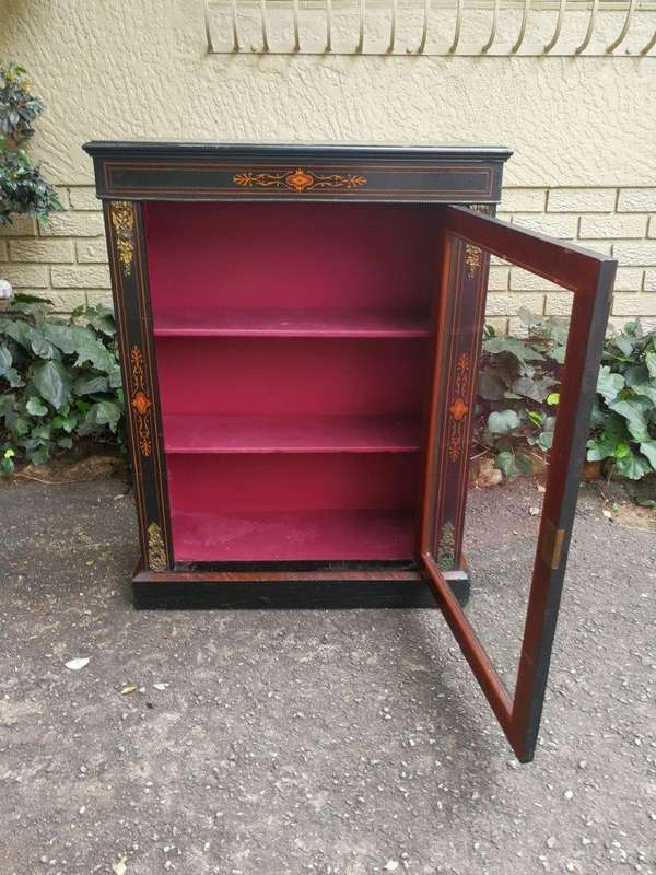 An Antique Victorian Ebonised And Marquetry Pier Cabinet With Gilt Metal Mounts And Key