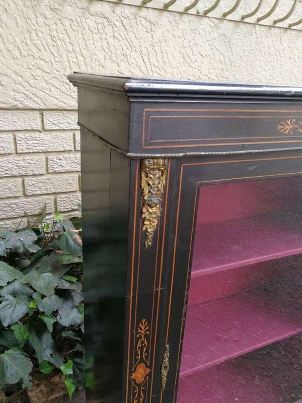 An Antique Victorian Ebonised And Marquetry Pier Cabinet With Gilt Metal Mounts And Key
