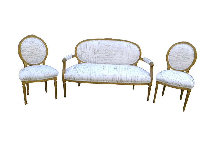 An Early 20th Century Set Of French Giltwood Louis XVI Style Settee And Pair of Chairs Upholstere...
