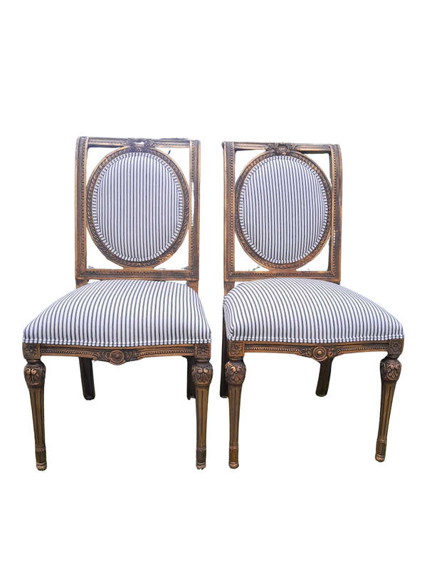 A Pair of French Style Hand-Gilded Chairs