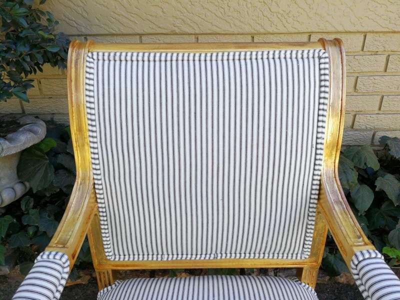 A Pair Of Carved And Gilded Armchairs