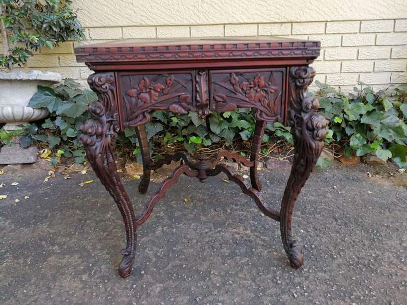 A 20th Century Carved Wooden Games Table with Four Drawers and Interior with Baize and Four Drawers