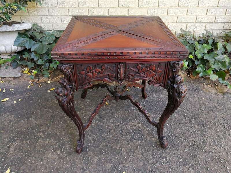 A 20th Century Carved Wooden Games Table with Four Drawers and Interior with Baize and Four Drawers