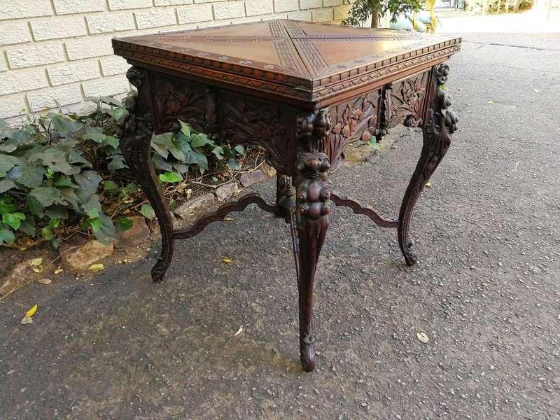 A 20th Century Carved Wooden Games Table with Four Drawers and Interior with Baize and Four Drawers