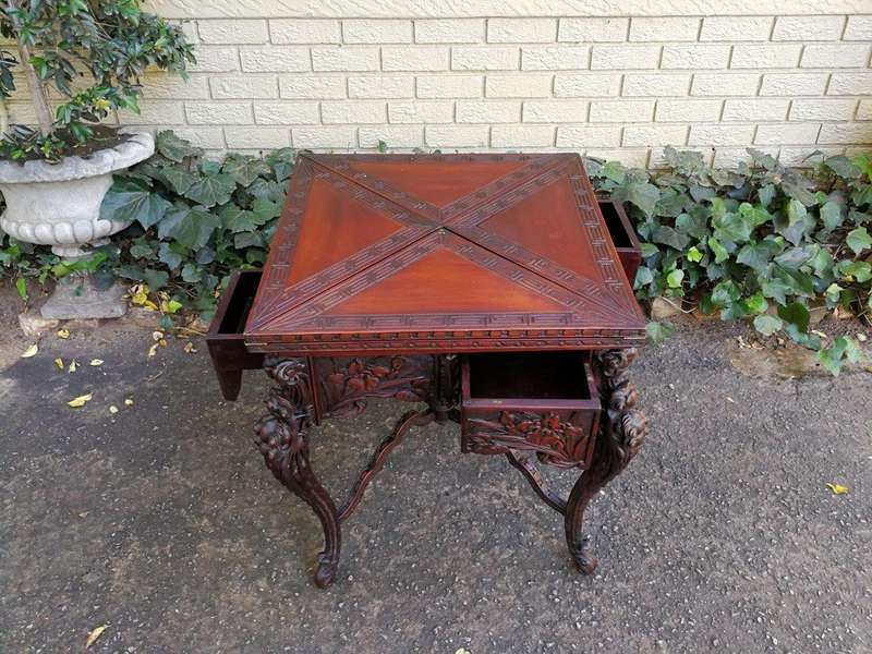 A 20th Century Carved Wooden Games Table with Four Drawers and Interior with Baize and Four Drawers