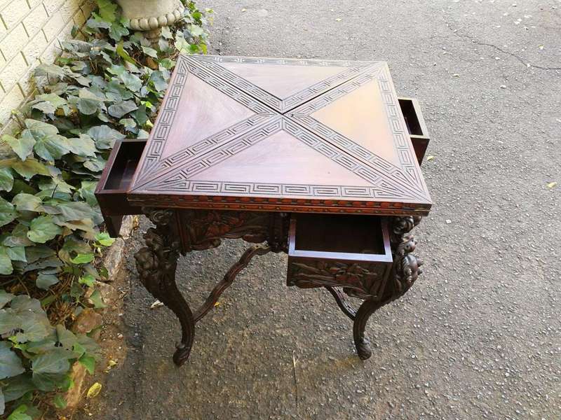 A 20th Century Carved Wooden Games Table with Four Drawers and Interior with Baize and Four Drawers