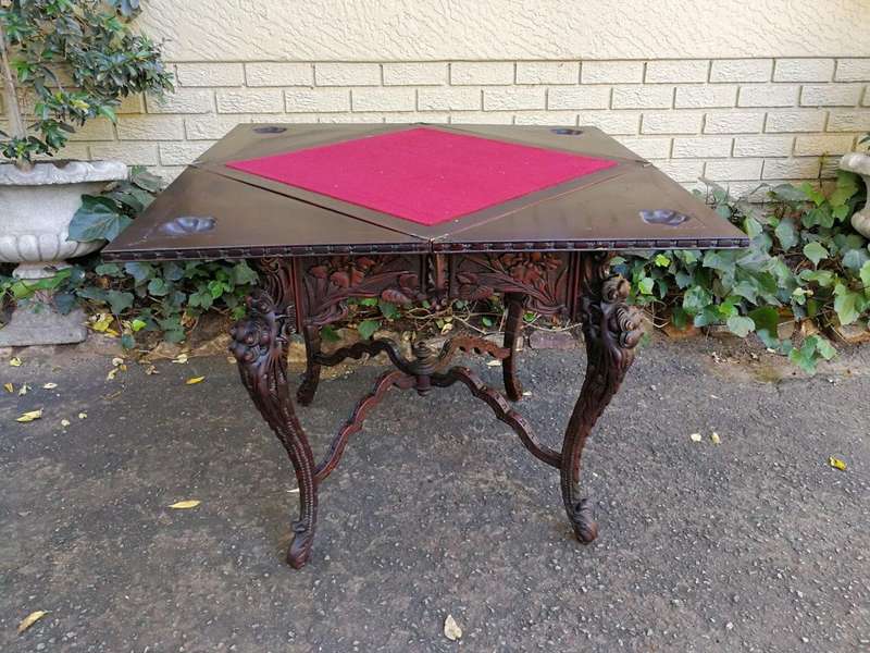 A 20th Century Carved Wooden Games Table with Four Drawers and Interior with Baize and Four Drawers
