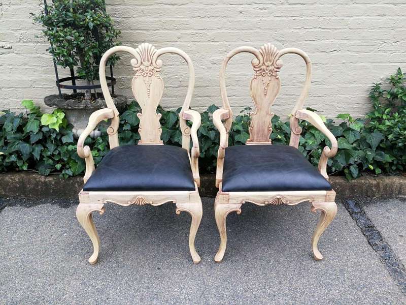 An Antique Pair of Bleached Walnut Carved Armchairs Upholstered in Leather