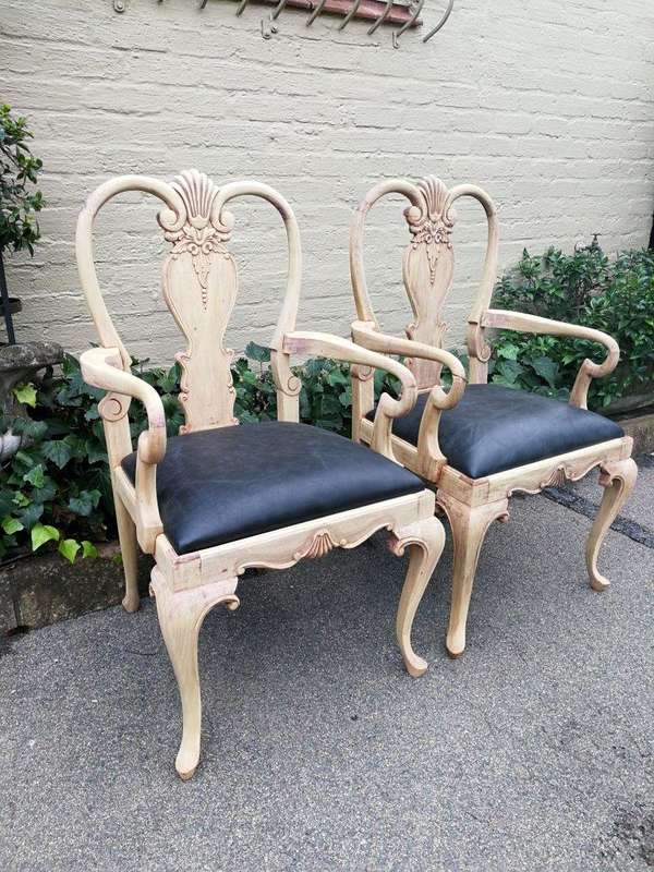 An Antique Pair of Bleached Walnut Carved Armchairs Upholstered in Leather