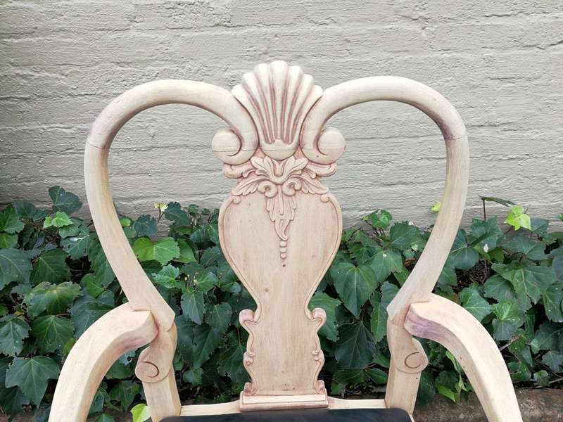 An Antique Pair of Bleached Walnut Carved Armchairs Upholstered in Leather