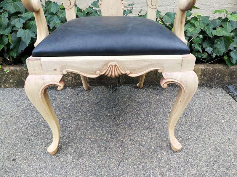 An Antique Pair of Bleached Walnut Carved Armchairs Upholstered in Leather