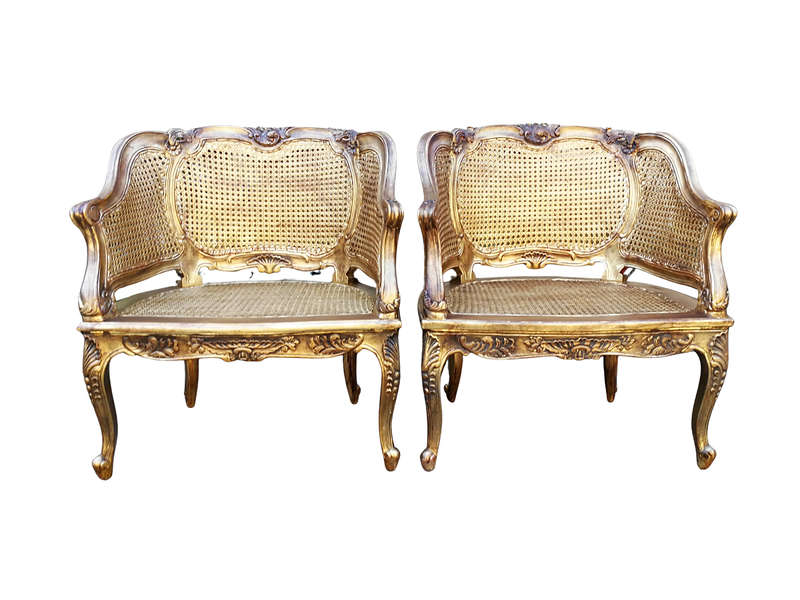 A 20th Century Pair or French Bergere Style Carved and Hand Gilded in Gold Leaf Wooden Chairs