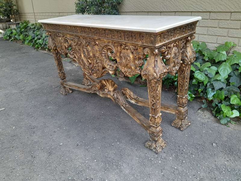 A 20th Century French Ornately Carved Giltwood  Console /Drinks Table with Marble Top