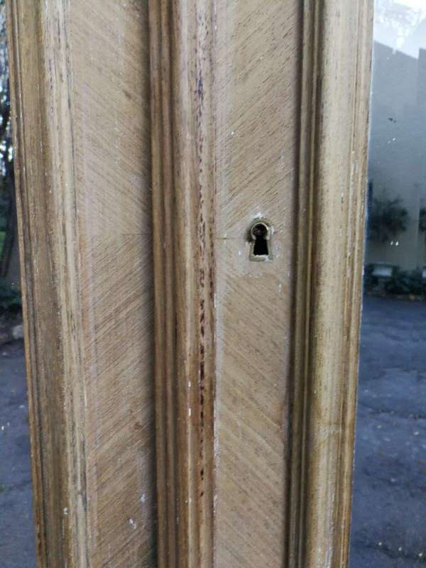 A 19th Century French Rococo Armoire In A Bleached Contemporary Finish With Bevelled Mirrors