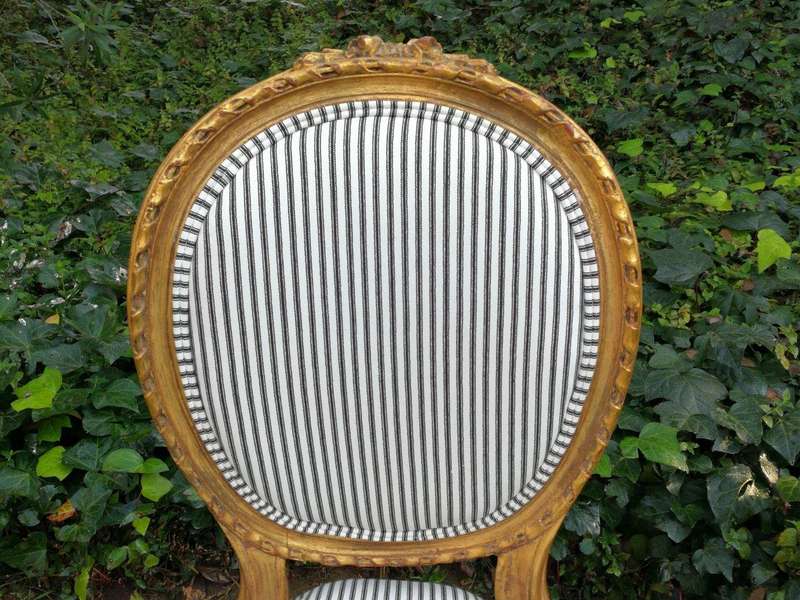 A 20th Century French Style Imported Set Of Twelve Gilded Dining Chairs Comprising: Two Carvers  ...