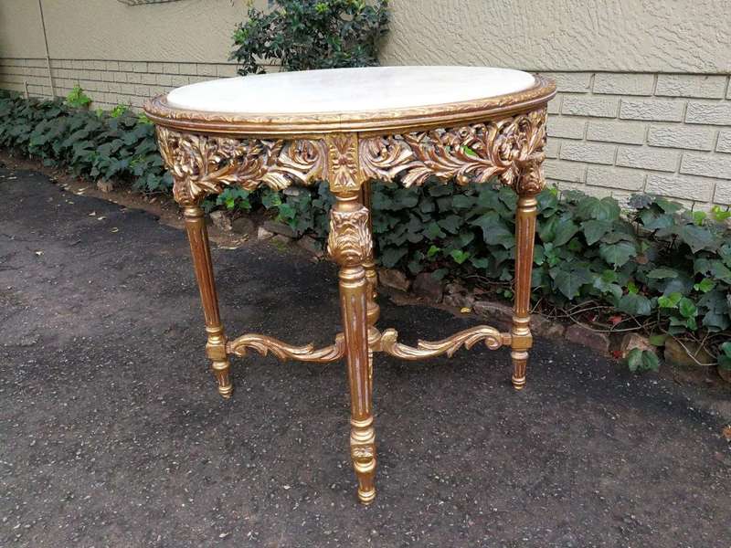 A French Style Ornately Carved Marble top Centre Table