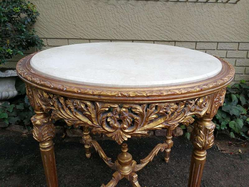 A French Style Ornately Carved Marble top Centre Table