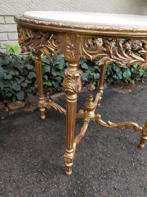 A French Style Ornately Carved Marble top Centre Table