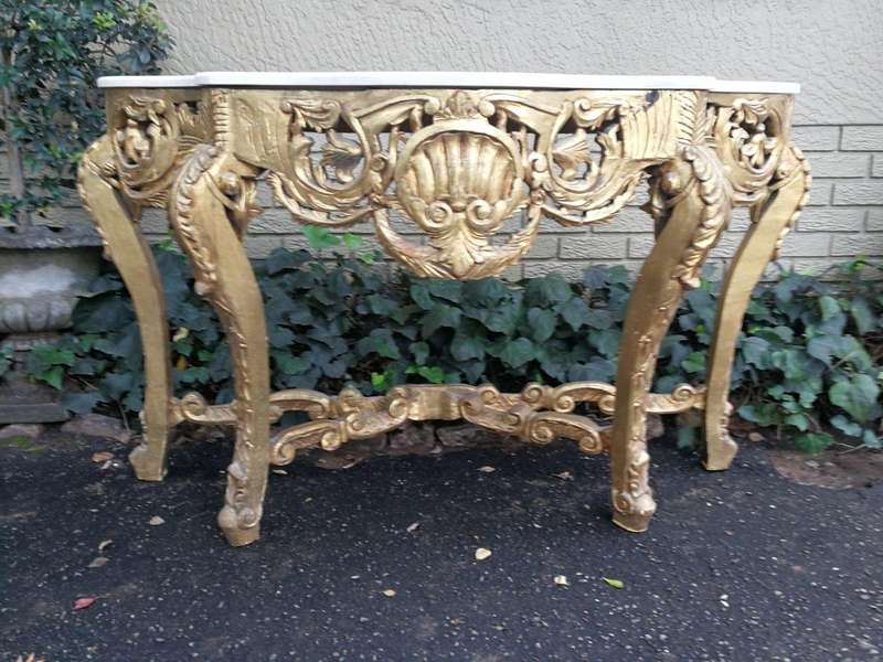 A French Rococo Style Ornately Carved Marble top Console Table