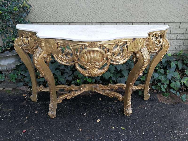 A French Rococo Style Ornately Carved Marble top Console Table