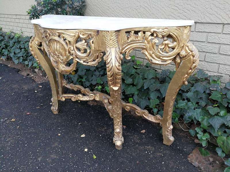 A French Rococo Style Ornately Carved Marble top Console Table